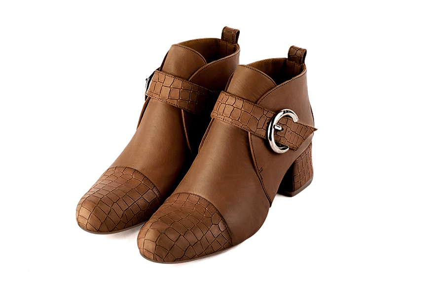 Caramel brown women's ankle boots with buckles at the front. Round toe. Low flare heels. Front view - Florence KOOIJMAN